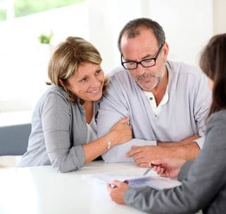 couple signing financial contract